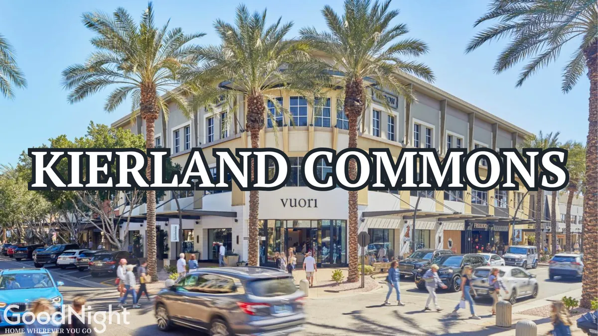This image captures the lively exterior of Kierland Commons, showcasing its distinctive architecture, palm trees, and a bustling pedestrian area filled with shoppers and diners. The setting perfectly reflects the vibrant, upscale atmosphere of Scottsdale’s premier shopping district.